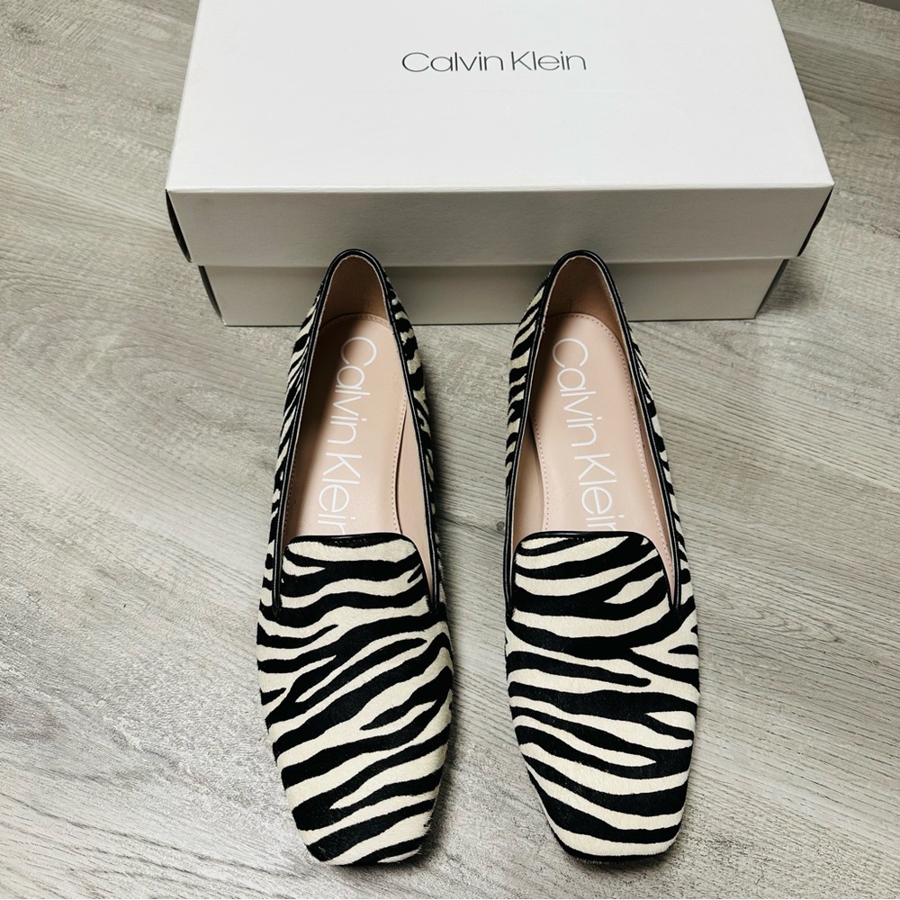Calvin Klein size 9 zebra striped flats, made in USA of real calf fur, with box